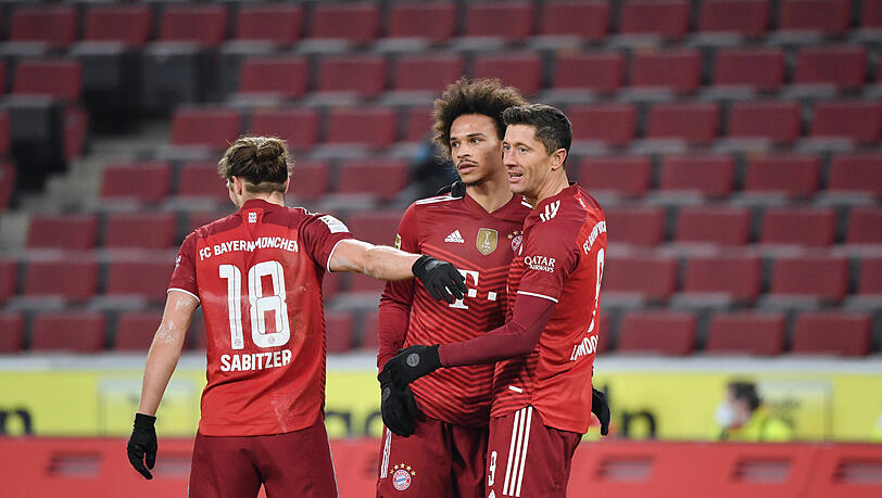 Der Schein trügt:  Zwischen Robert Lewandowski und Leroy Sané soll es auch mal Unstimmigkeiten gegeben haben.