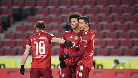 Der Schein trügt:  Zwischen Robert Lewandowski und Leroy Sané soll es auch mal Unstimmigkeiten gegeben haben.