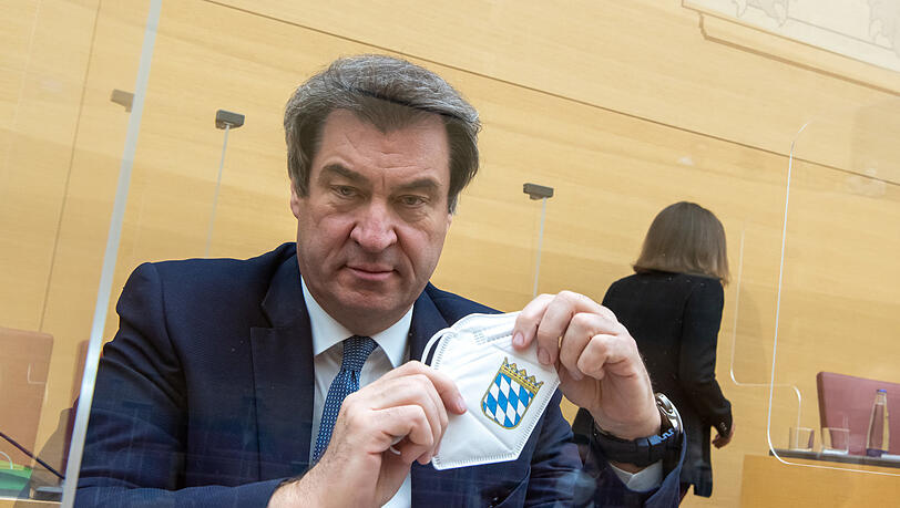 Markus Söder (CSU), Ministerpräsident von Bayern, nimmt an der Sondersitzung des bayerischen Landtags zur Corona-Krise teil. Das Parlament diskutiert die Beschlüsse von Ministerpräsidentenkonferenz und Kabinett zum weiteren Vorgehen in der Pandemie. Markus Söder (CSU), Ministerpräsident von Bayern, nimmt an der Sondersitzung des bayerischen Landtags zur Corona-Krise teil. Das Parlament diskutiert die Beschlüsse von Ministerpräsidentenkonferenz und Kabinett zum weiteren Vorgehen in der Pandemie.
