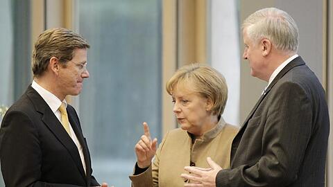 Das Führungstrio der Koalitionsparteien: Westerwelle, Merkel und Seehofer