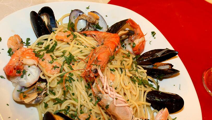 Auf der Karte stehen die Klassiker der italienischen Küche – etwa Pasta mit Meeresfrüchten. Auf der Karte stehen die Klassiker der italienischen Küche – etwa Pasta mit Meeresfrüchten.