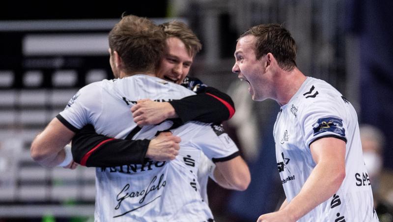 Spieler des THW Kiel jubeln nach der Partie gegen Telekom Veszprem.