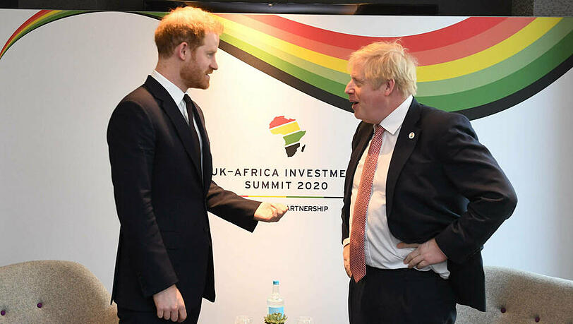 Prinz Harry im Gespräch mit Premierminister Boris Johnson Prinz Harry im Gespräch mit Premierminister Boris Johnson