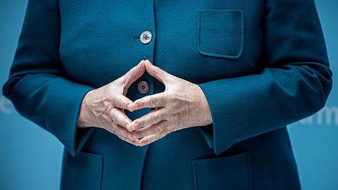 Die "Raute" war eine Art Markenzeichen der Kanzlerin Merkel. (Archivbild)