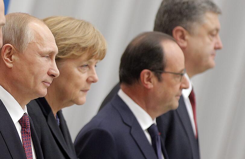 Der ukrainische Präsident Petro Poroschenko (r.) mit Francois Hollande, Angela Merkel und Wladimir Putin (l.).