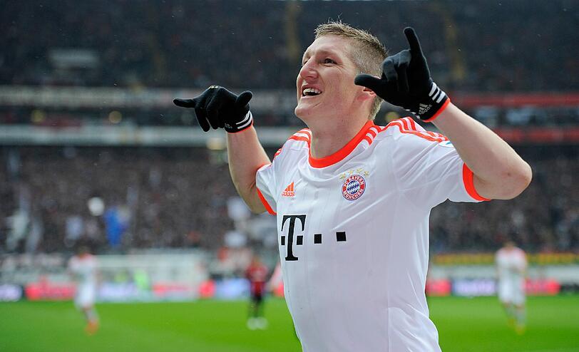 Sein Tor, sein sechster Meistertitel: Bastian Schweinsteiger, der auf Lahm-Vorlage das 1:0 in Frankfurt erzielte. Foto: GES