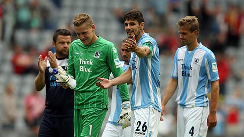 Gefrustet: Die Löwen nach der 0:1-Niederlage gegen Bundesliga-Absteiger Freiburg in der Allianz Arena.