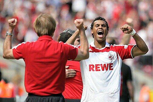 Aufstiegsjubel: Marvin Matip (r.) vor Trainer Christoph Daum