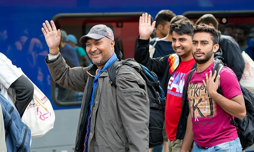 Flüchtlinge kommen am Hauptbahnhof München an.