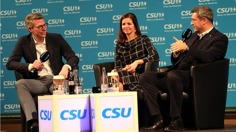 Markus Blume (li.) im Gespräch mit Markus Söder (re.) und OB-Kandidatin Kristina Frank.