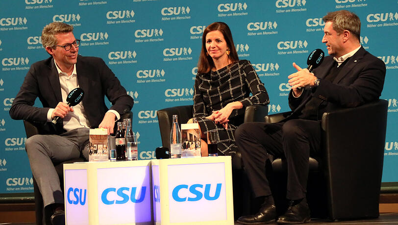 Markus Blume (li.) im Gespräch mit Markus Söder (re.) und OB-Kandidatin Kristina Frank. Markus Blume (li.) im Gespräch mit Markus Söder (re.) und OB-Kandidatin Kristina Frank.