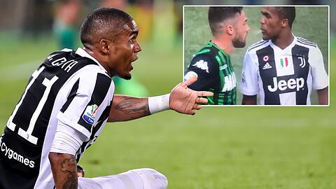 Douglas Costa außer Kontrolle. Zum traurigen Höhepunkt der Auseinandersetzung spuckt er seinem Gegenspieler ins Gesicht.
