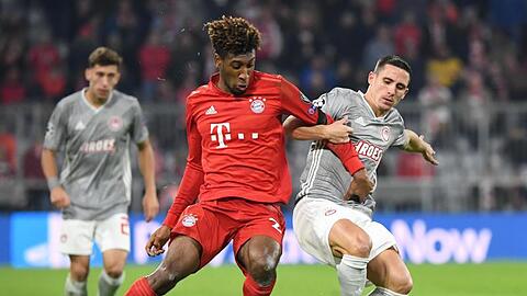 Kingsley Coman von München kämpft um den Ball. Foto: Matthias Balk/dpa