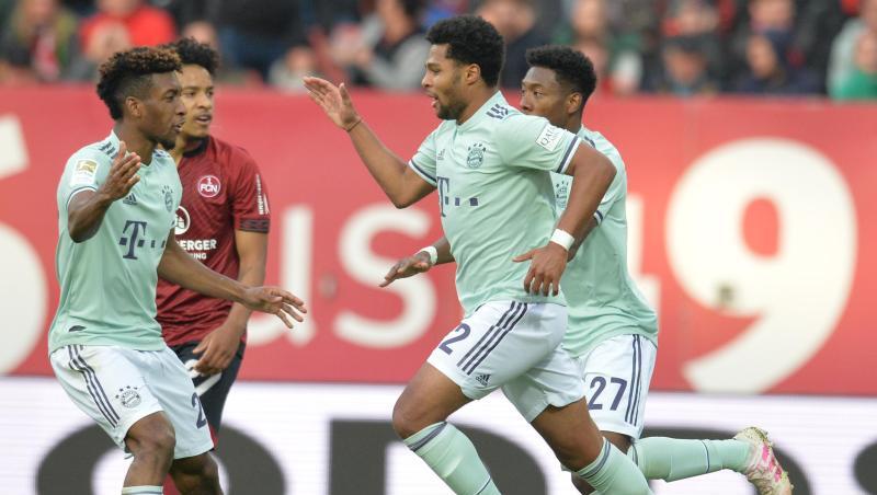Die Münchner Kingsley Coman (l) und Serge Gnabry jubeln über den Treffer zum 1:1. Foto: Timm Schamberger Die Münchner Kingsley Coman (l) und Serge Gnabry jubeln über den Treffer zum 1:1. Foto: Timm Schamberger