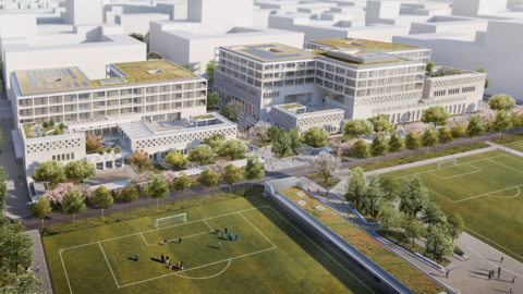 So sieht der Campus (links Grundschule, rechts Gymnasium) später von der anderen Seite aus. Dahinter: Bis zu 65 Meter hohe Häuser.