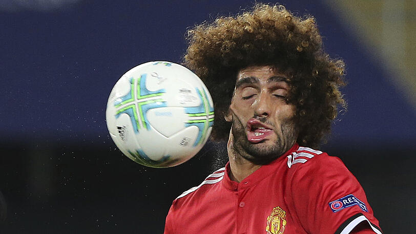 Getroffen: Der Belgier Marouane Fellaini von Manchester United im UEFA-Supercup gegen Real Madrid (1:2).