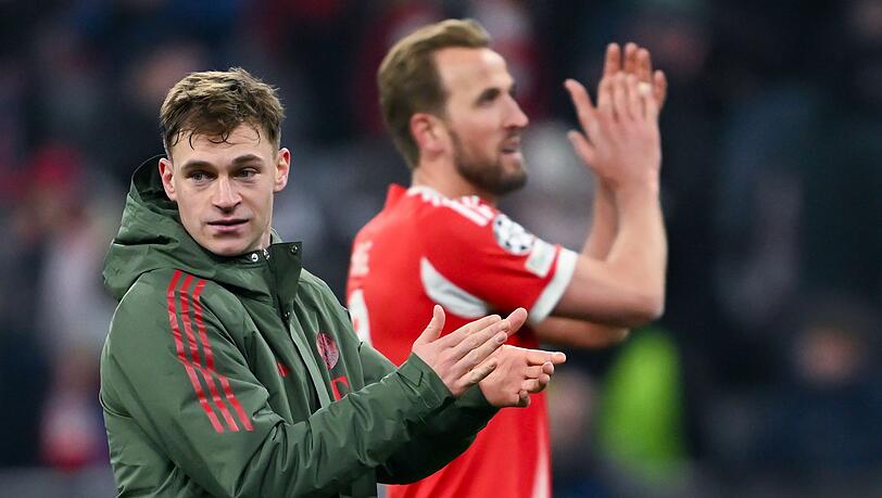 Das erste Etappenziel ist erreicht: Joshua Kimmich (l) und Harry Kane feiern den Einzug ins Achtelfinale. Das erste Etappenziel ist erreicht: Joshua Kimmich (l) und Harry Kane feiern den Einzug ins Achtelfinale.