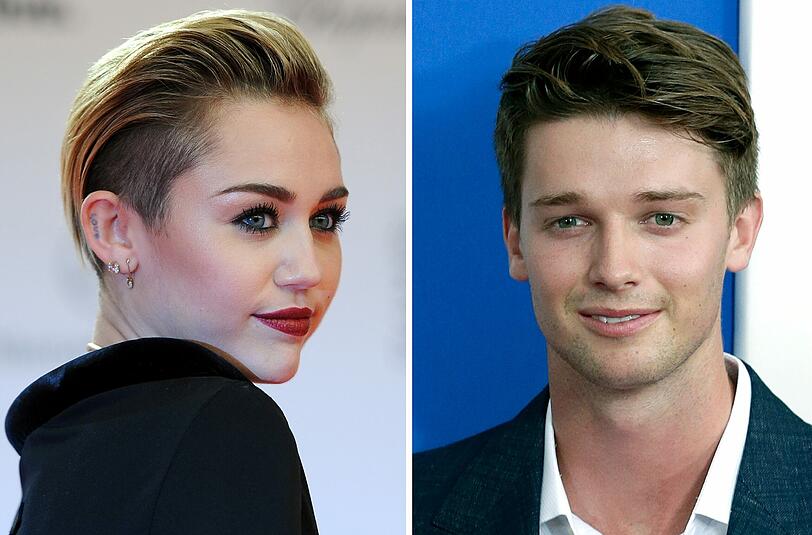 Nach Partyfotos mit einer anderen Frau hat sich der Freund von Sängerin Miley Cyrus (l), Patrick Schwarzenegger, verteidigt. "Das ist die Freundin einer meiner besten Freunde", twitterte der Sohn von Arnold Schwarzenegger und Maria Shriver. "Ich würde nie etwas gegen meine eigene Freundin tun."