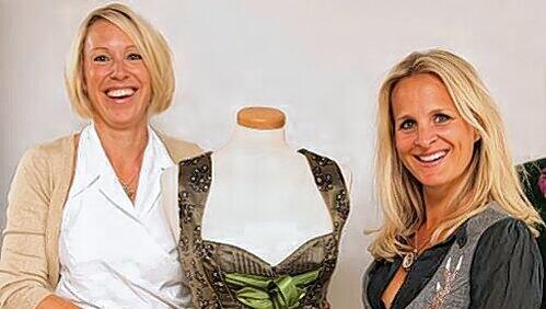 Dirndl als Hingucker: Madeleine Bierbrauer (l.) und Nina Wirtz mit einem Kleid, das die Finalistinnen auf dem Laufsteg tragen werden. Dirndl als Hingucker: Madeleine Bierbrauer (l.) und Nina Wirtz mit einem Kleid, das die Finalistinnen auf dem Laufsteg tragen werden.