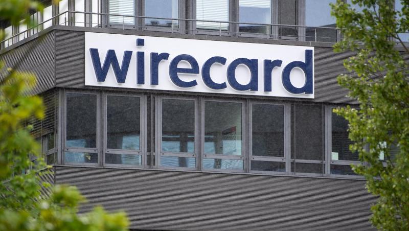 Der Schriftzug von Wirecard ist an der Firmenzentrale zu sehen. Foto: Sven Hoppe/dpa/Archivbild