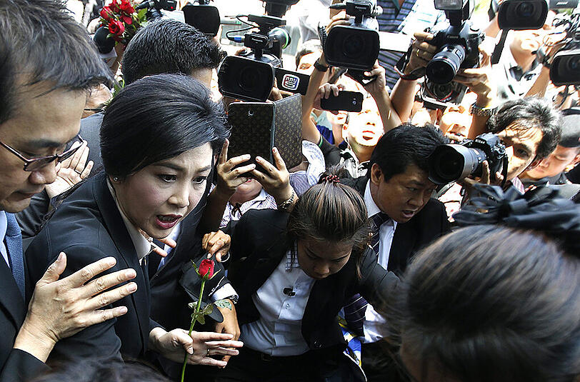 Thailands früherer Regierungschefin Yingluck Shinawatra drohen zehn Jahre Haft. Foto: Narong Sangnak