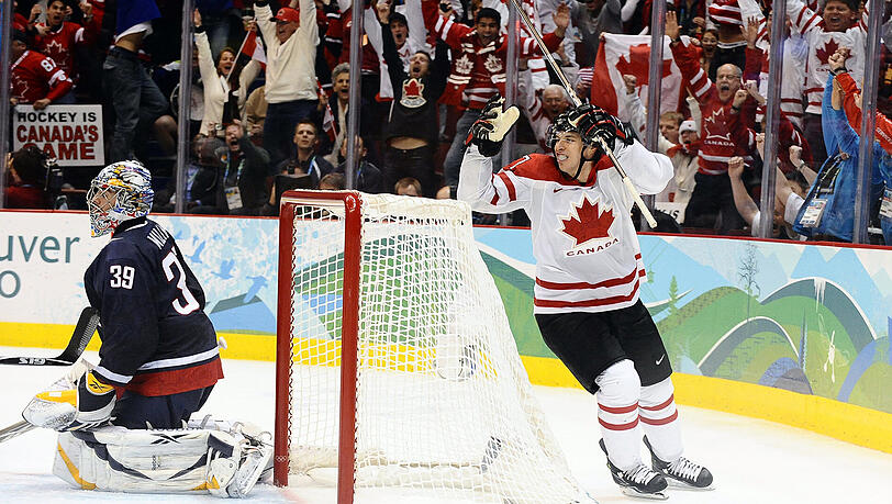 2010 in Vancouver: Superstar Sidney Crosby trifft in der Overtime gegen die USA und versetzt die Eishockey-verrückten Kanadier in kollektiven Jubel. 2010 in Vancouver: Superstar Sidney Crosby trifft in der Overtime gegen die USA und versetzt die Eishockey-verrückten Kanadier in kollektiven Jubel.