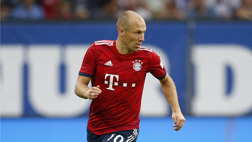 Arjen Robben in Aktion: Die drei Adidas-Streifen sind deutlich auf dem Trikot zu sehen. Arjen Robben in Aktion: Die drei Adidas-Streifen sind deutlich auf dem Trikot zu sehen.