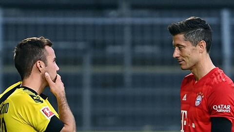 Wird BVB-Star Mario Götze (l) wieder Teamkollege von Bayern-Stürmer Robert Lewandowski?.
