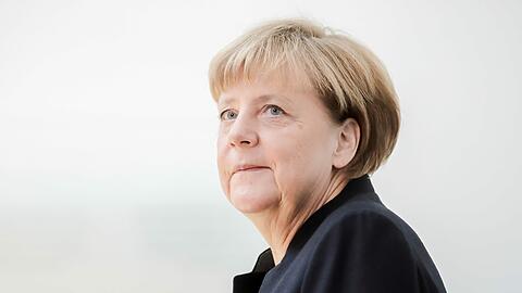 Bundeskanzlerin Angela Merkel wird von DGB-Chef Reiner Hoffmann stark kritisiert.