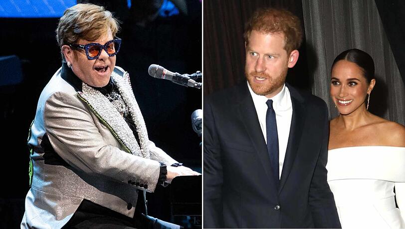 Elton John sorgte für einen skurrilen Moment, als er auf seinem München-Konzert ein Foto von Harry und Meghan zeigte.