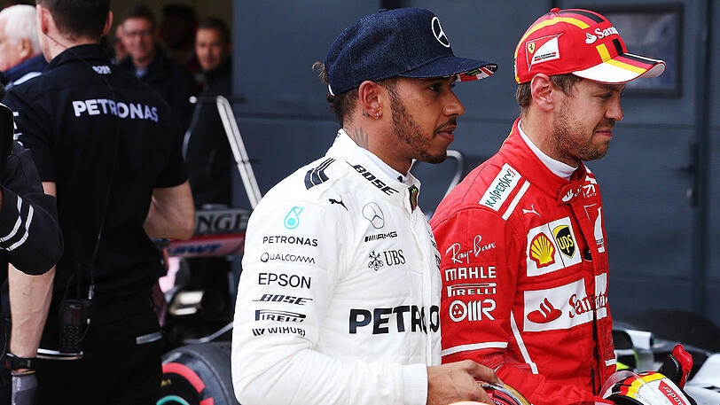 Er ist wieder da: Lewis Hamilton kann am Wochenende in Ungarn die WM-Führung von Sebastian Vettel (rechts) übernehmen.