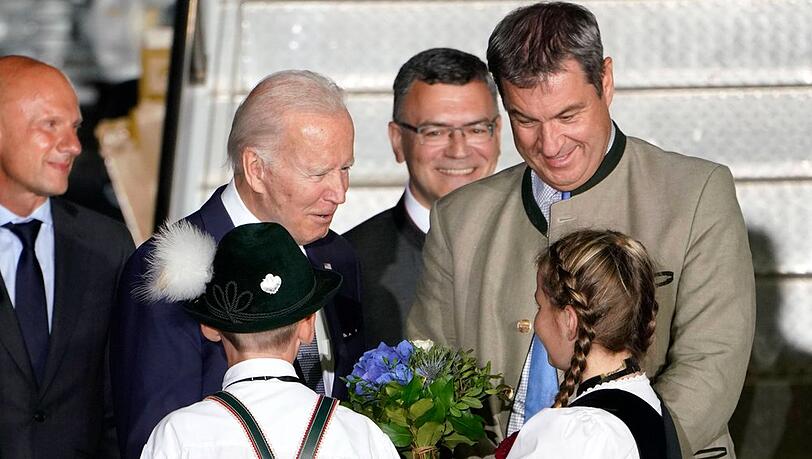 Joe Biden (l.) kann sich nicht nur über Blumen freuen...