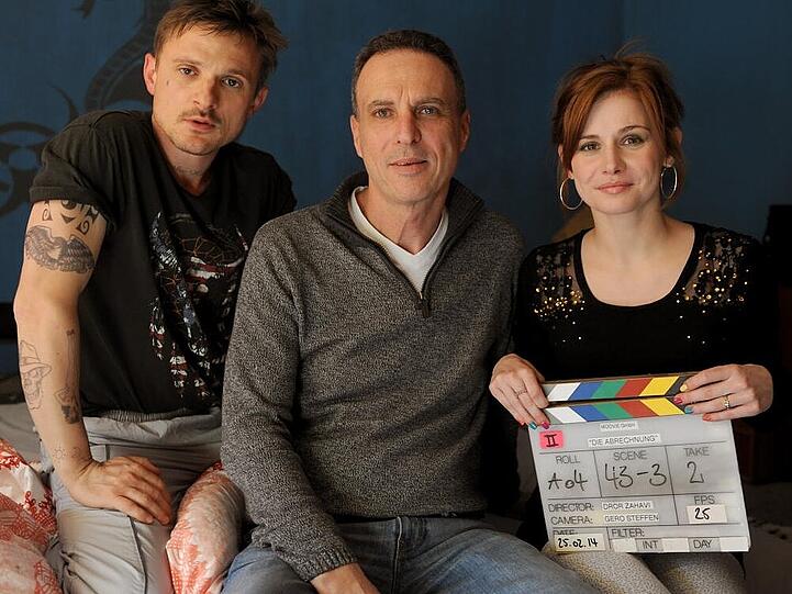 Regisseur Dror Zahavi (Mitte) mit den Schauspielern Florian Lukas und Josefine Preuß