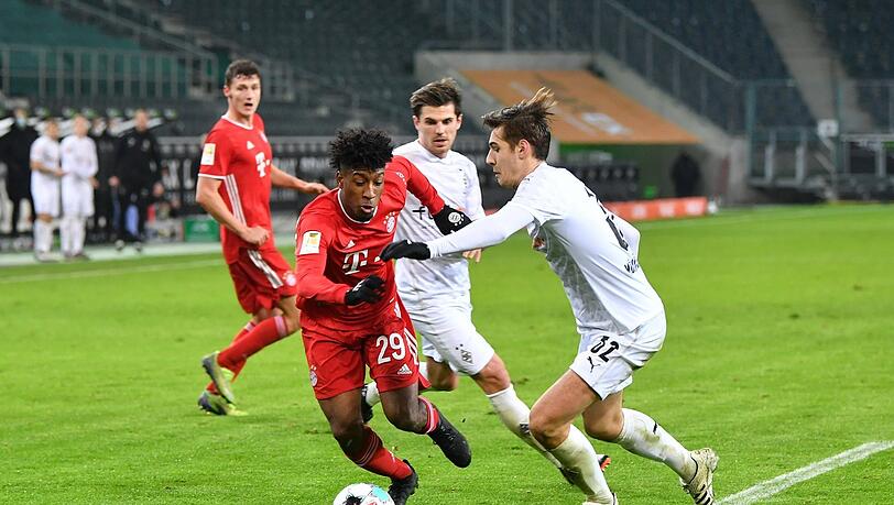 Farbloser Auftritt: Bayern-Stürmer Kingsley Coman (l.) kann nach seiner Einwechslung gegen Mönchengladbach keine Akzente setzen. Farbloser Auftritt: Bayern-Stürmer Kingsley Coman (l.) kann nach seiner Einwechslung gegen Mönchengladbach keine Akzente setzen.
