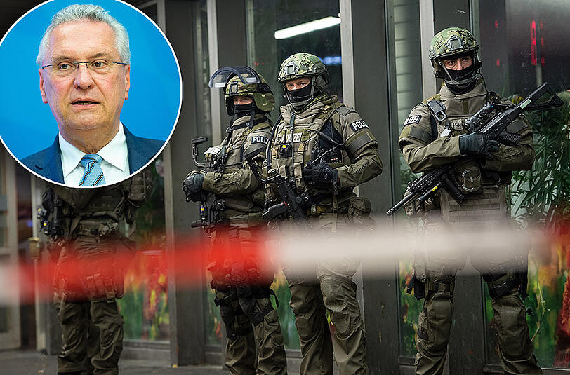 Polizisten sichern den Münchner Hauptbahnhof. CSU-Innenminister Joachim Herrmann verspricht bei der Präsentation seines Sicherheitsberichts, die Ängste der Bürger ernst zu nehmen.