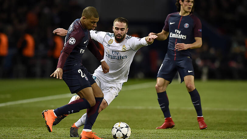 Kylian Mbappe von Paris St.-Germain (links) versetzt Daniel Carvajal von Real Madrid - das Ausscheiden konnte auch er nicht verhindern.