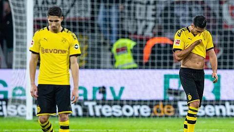 Nach dem Tor zur 4:3-Führung für Leverkusen ist Dortmunds Emre Can (r) die Freude über sein Traumtor zuvor vergangen.