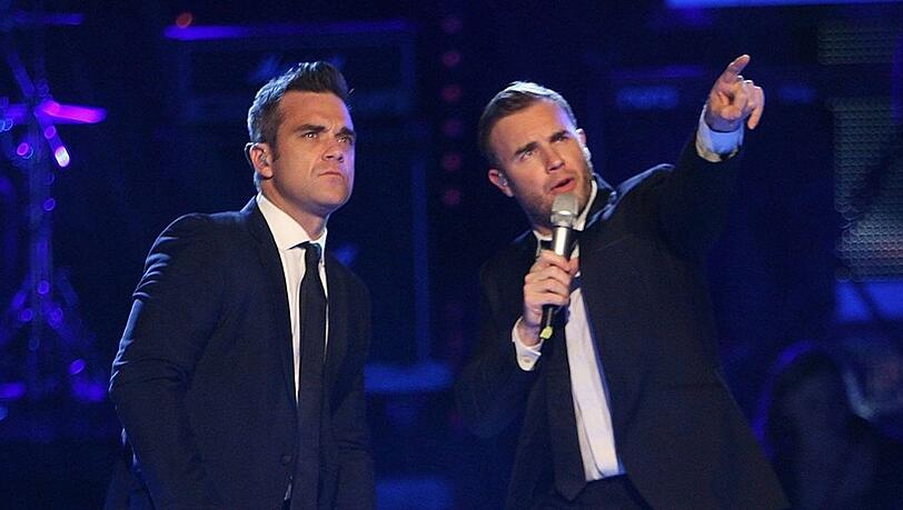 Robbie Williams (l.) und Gary Barlow versöhnten sich 2009.