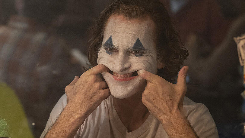 Joaquin Phoenix als Comic-Schurke Joker. Joaquin Phoenix als Comic-Schurke Joker.