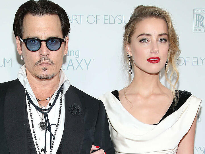Amber Heard mit Johnny Depp auf einer Veranstaltung im Januar: Weiß steht ihr schon mal gut
