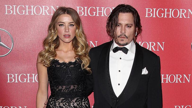 Amber Heard und Johnny Depp lassen sich nach nur 15 Monaten Ehe scheiden. Amber Heard und Johnny Depp lassen sich nach nur 15 Monaten Ehe scheiden.