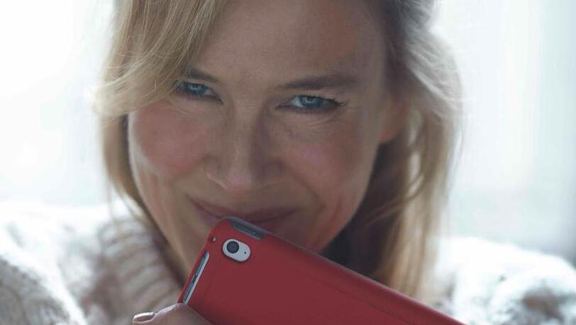 Eine moderne Bridget Jones: Statt einem Tagebuch umklammert Schauspielerin Renée Zellweger ein iPad Eine moderne Bridget Jones: Statt einem Tagebuch umklammert Schauspielerin Renée Zellweger ein iPad