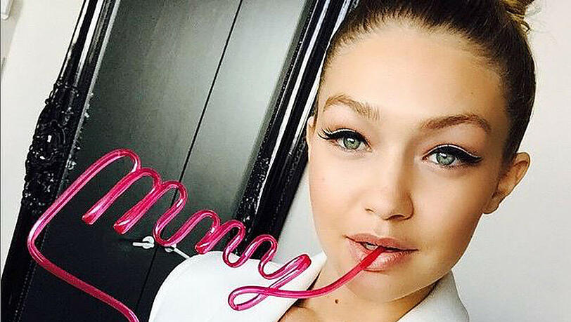 Topmodel Gigi Hadid nutzt neben Instagram auch die neue App "Wine'N'Dine" Topmodel Gigi Hadid nutzt neben Instagram auch die neue App "Wine'N'Dine"
