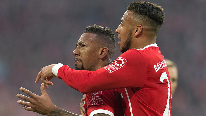 Erster Saisontreffer für Jerome Boateng: Corentin Tolisso (rechts) freut sich mit dem Innenverteidiger über das Tor der Bayern zum 2:2 gegen Hoffenheim.