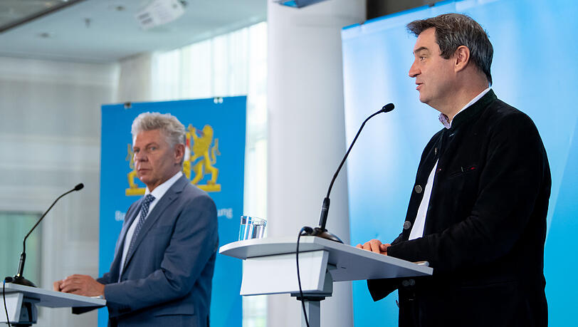 Dieter Reiter (l.) und Markus Söder geben gemeinsam die Wiesn-Absage bekannt.
