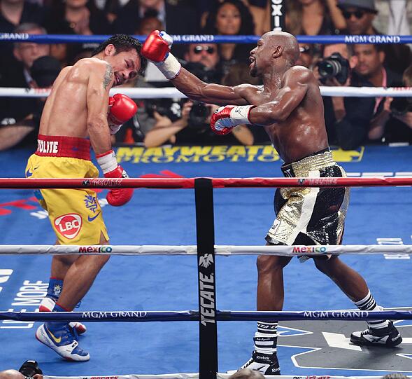 Floyd Mayweather hat den Angriff von Manny Pacquiao im Rekord-Boxkampf erfolgreich abgewehrt und bleibt auch in seinem 48. Profi-Duell ungeschlagen. Der Fight in Bildern.