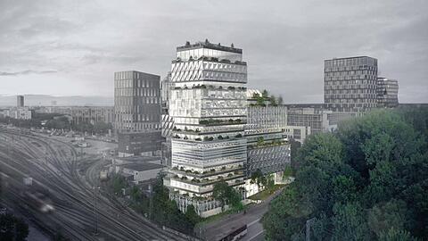 Eine außergewöhnliche Fassade an den Gleisen, die ein modernes Lebensgefühl spiegelt: stark gegliedert, mit grünen Terrassenbändern und lebenswerten Dachgärten. Die drei Gebäudeteile sind mit zwölf, 15 und 18 Stockwerken geplant.