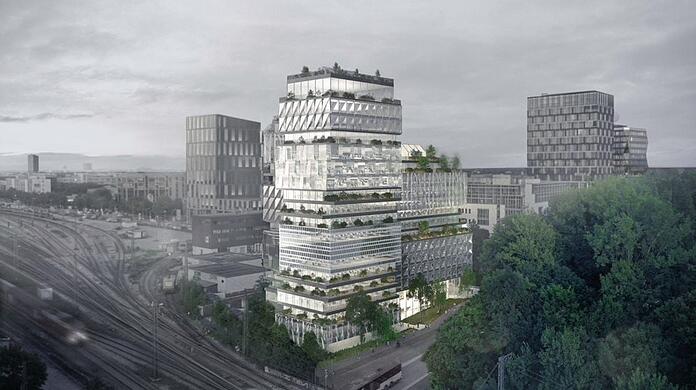 Eine außergewöhnliche Fassade an den Gleisen, die ein modernes Lebensgefühl spiegelt: stark gegliedert, mit grünen Terrassenbändern und lebenswerten Dachgärten. Die drei Gebäudeteile sind mit zwölf, 15 und 18 Stockwerken geplant.