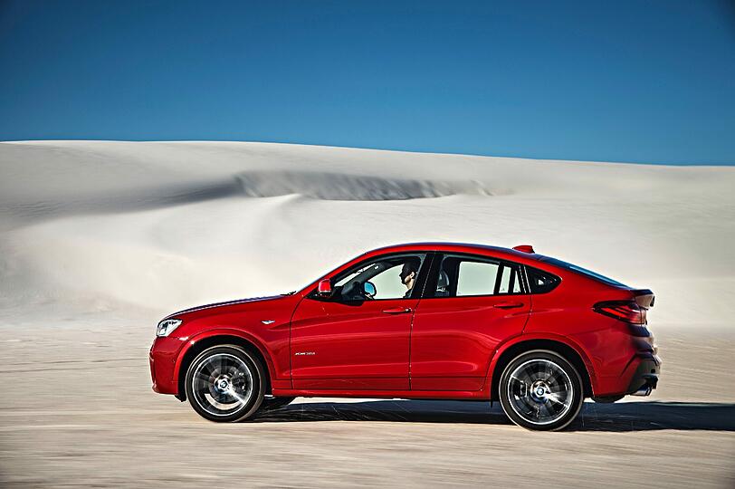 Noch so einer, nur kleiner: BMW stellt dem opulenten X6 mit dem X4 eine schmächtigere, aber immer noch massige Variante eines SUV-Coupés zur Seite.