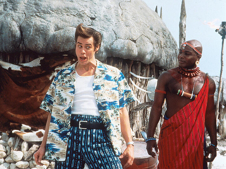 Ace Ventura (Jim Carrey, l.) und Stammesmitglied Ouda - zwei Kulturen treffen aufeinander.